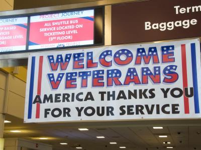 sign welcoming veterans at dulles airport